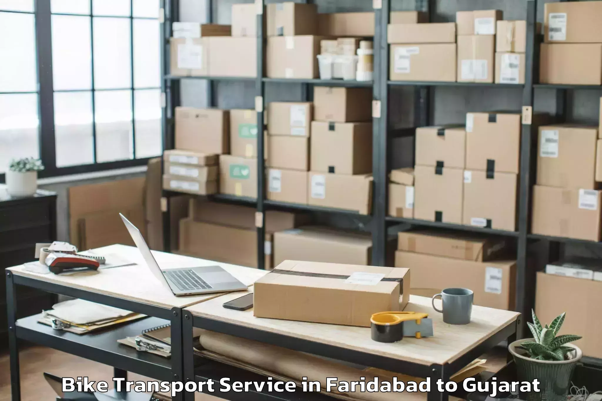 Affordable Faridabad to Udhana Bike Transport